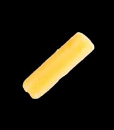 shred of Tillamook cheddar cheese