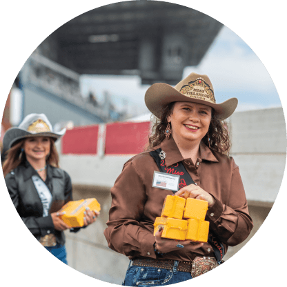 Cowgirls holding cheese